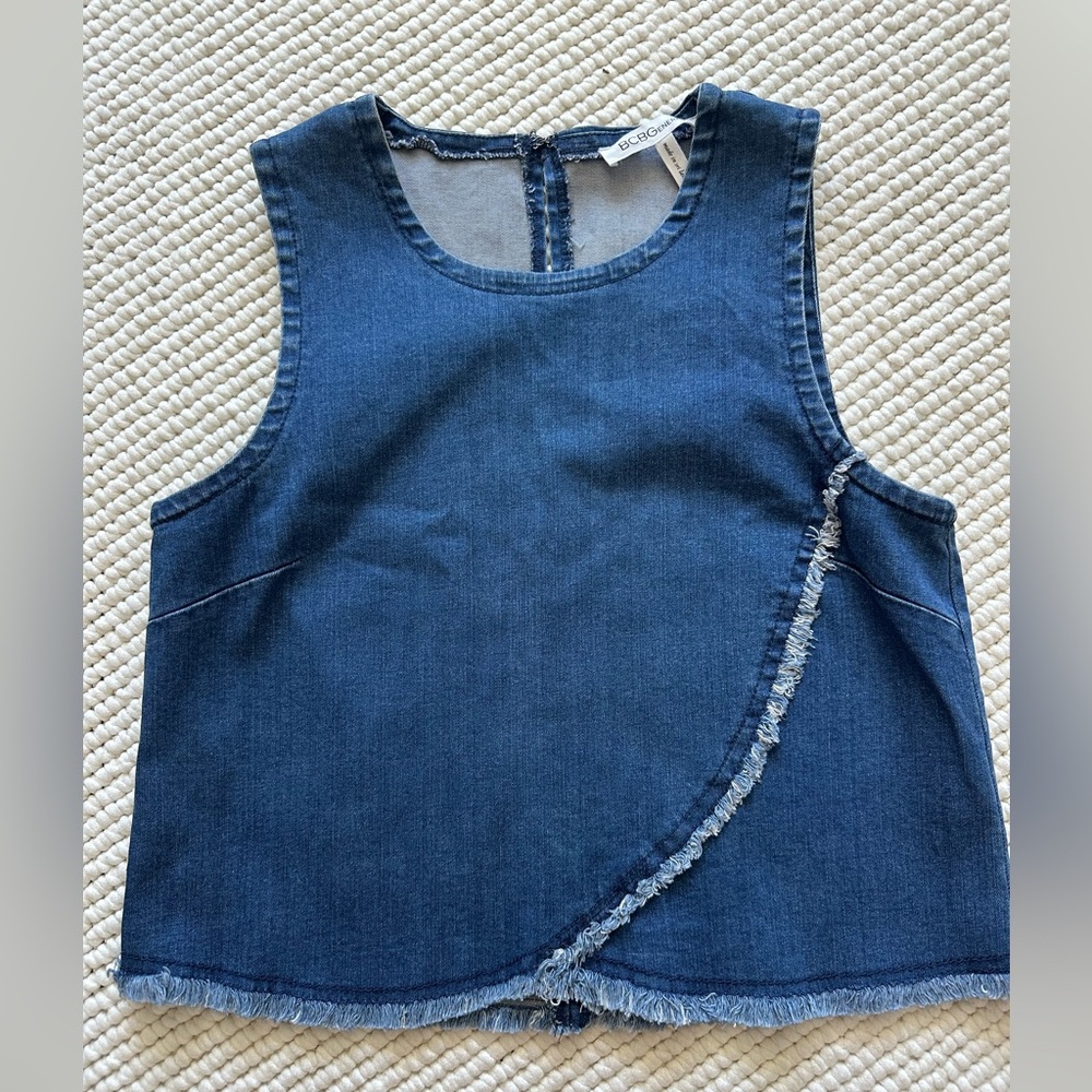BCBG denim top with fringe detail 
Size XS